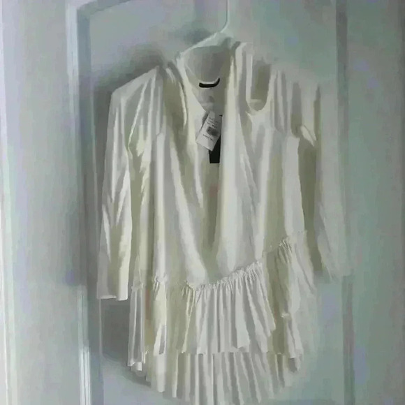 Soprano Tops - Ivory,  women's,  cold shoulder top. Sz med by Soprano. NWT from Dillard's.